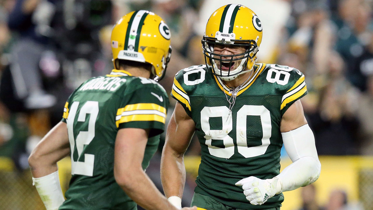 GREEN BAY, WISCONSIN - SEPTEMBER 26: Aaron Rodgers #12 and Jimmy Graham #80 of the Green Bay Packers celebrate after scoring a touchdown in the third quarter against the Philadelphia Eagles at Lambeau Field on September 26, 2019 in Green Bay, Wisconsin.