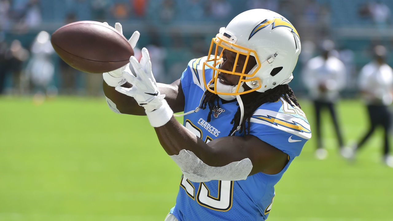 MIAMI, FL - SEPTEMBER 29: Melvin Gordon #25 of the Los Angeles Chargers in action during pregame before the start of the game against the Miami Dolphins at Hard Rock Stadium on September 29, 2019 in Miami, Florida.