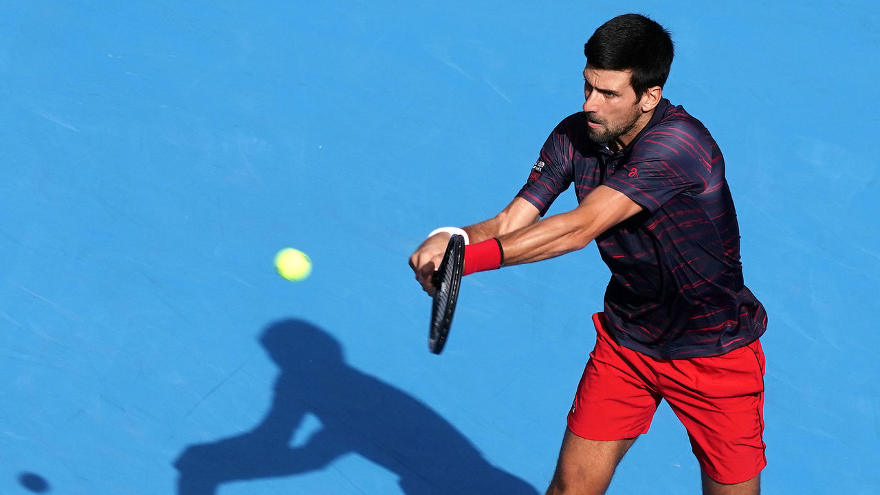 TOKYO, JAPAN - OCTOBER 04: Novak Djokovic of Serbia returns a shot during his match against Lucas Pouille of France on day five of the Rakuten Open at the Ariake Coliseum on October 04, 2019 in Tokyo, Japan.