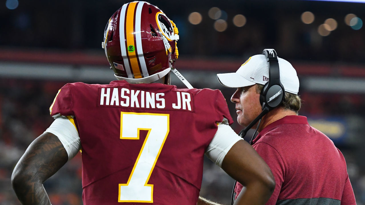 CLEVELAND, OH - AUGUST 8, 2019: Head coach Jay Gruden of the Washington Redskins talks with quarterback Dwayne Haskins #7 during a timeout in the second quarter of a preseason game against the Cleveland Browns on August 8, 2019 at FirstEnergy Stadium in Cleveland, Ohio. (Photo by: 2019 Nick Cammett/Diamond Images via Getty Images)