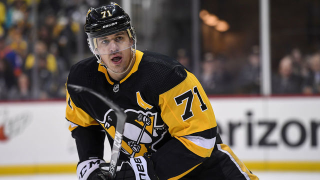 PITTSBURGH, PA - APRIL 14: Pittsburgh Penguins center Evgeni Malkin (71) looks on during the second period in Game 3 of the First Round in the 2019 NHL Stanley Cup Playoffs between the New York Islanders and the Pittsburgh Penguins on April 14, 2019, at PPG Paints Arena in Pittsburgh, PA.