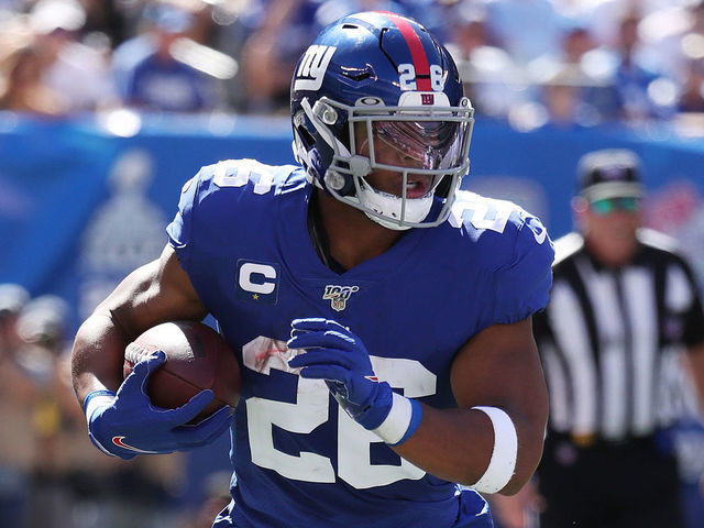 EAST RUTHERFORD, NEW JERSEY - SEPTEMBER 15: Saquon Barkley #26 of the New York Giants in action against the Buffalo Bills during their game at MetLife Stadium on September 15, 2019 in East Rutherford, New Jersey.