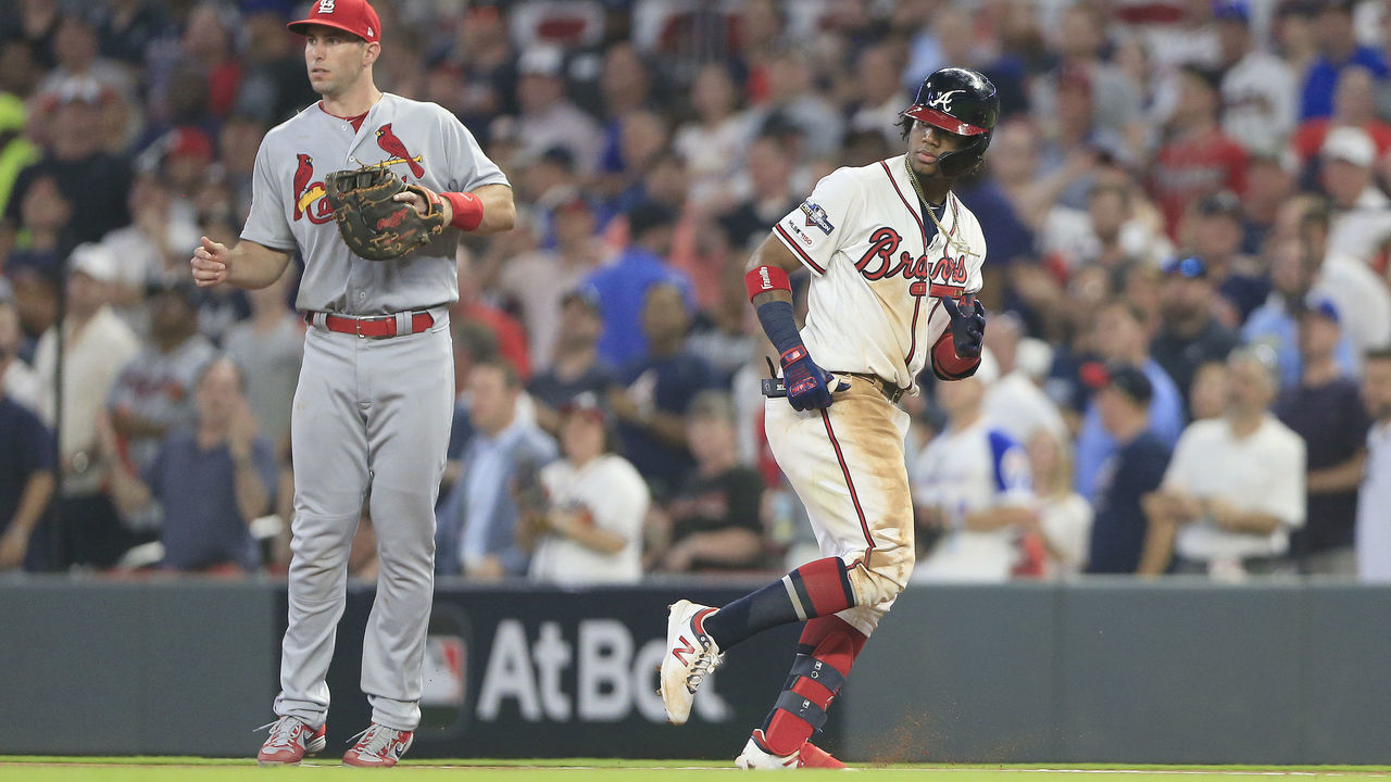 ATLANTA, GA - OCTOBER 03: Ronald Acuna Jr. (13) of the Atlanta Braves heads back to first base during the first game of the National League Division Series between the Atlanta Braves and the St. Louis Cardinals on October 3, 2019 at Suntrust Park in Atlanta, Georgia.