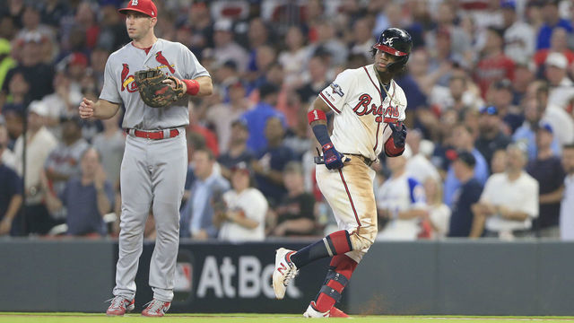 ATLANTA, GA - OCTOBER 03: Ronald Acuna Jr. (13) of the Atlanta Braves heads back to first base during the first game of the National League Division Series between the Atlanta Braves and the St. Louis Cardinals on October 3, 2019 at Suntrust Park in Atlanta, Georgia.
