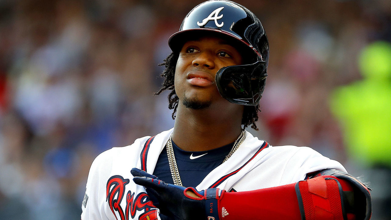 ATLANTA, GEORGIA - OCTOBER 03: Ronald Acuna Jr. #13 of the Atlanta Braves reacts against the St. Louis Cardinals during the first inning in game one of the National League Division Series at SunTrust Park on October 03, 2019 in Atlanta, Georgia.