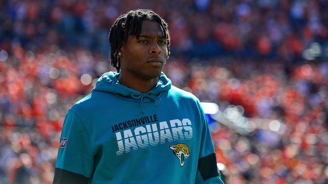 DENVER, CO - SEPTEMBER 29: Jalen Ramsey #20 of the Jacksonville Jaguars walks onto the field in street clothes before a game against the Denver Broncos at Empower Field at Mile High on September 29, 2019 in Denver, Colorado.