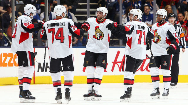 TORONTO, ON - OCTOBER 02: Bobby Ryan #9 (C) of the Ottawa Senators celebrates a goal with teammates during an NHL game against the Toronto Maple Leafs at Scotiabank Arena on October 2, 2019 in Toronto, Canada.