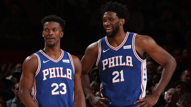NEW YORK, NY - FEBRUARY 13: Jimmy Butler #23 and Joel Embiid #21 of the Philadelphia 76ers smile during a game against the New York Knicks on February 13, 2019 at Madison Square Garden in New York City, New York. Mandatory Copyright Notice: Copyright 2019 NBAE