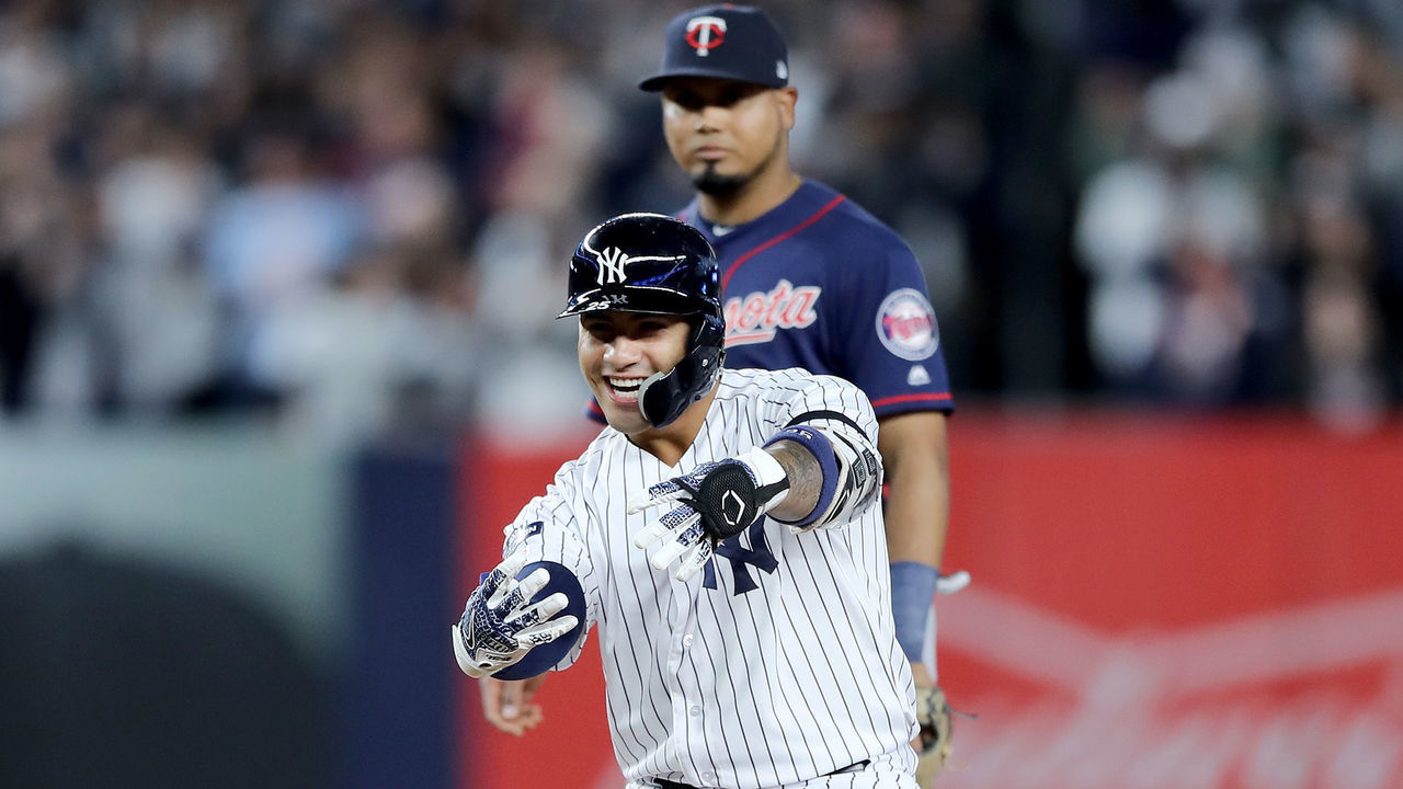NEW YORK, NEW YORK - OCTOBER 04: Gleyber Torres #25 of the New York Yankees celebrates after hitting an RBI double to score Aaron Judge #99 and Brett Gardner #11 against Tyler Duffey #21 of the Minnesota Twins during the fifth inning in game one of the American League Division Series at Yankee Stadium on October 04, 2019 in New York City.