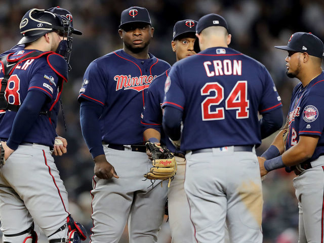 NEW YORK, NEW YORK - OCTOBER 04: The Minnesota Twins talk on the mound against the New York Yankees during the fifth inning in game one of the American League Division Series at Yankee Stadium on October 04, 2019 in New York City.