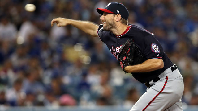 LOS ANGELES, CA - OCTOBER 04: Max Scherzer #31 of the Washington Nationals pitches in relief in the eighth inning against the Los Angeles Dodgers during Game 2 of the NLDS between the Washington Nationals and the Los Angeles Dodgers at Dodger Stadium on Friday, October 4, 2019 in Los Angeles, California.