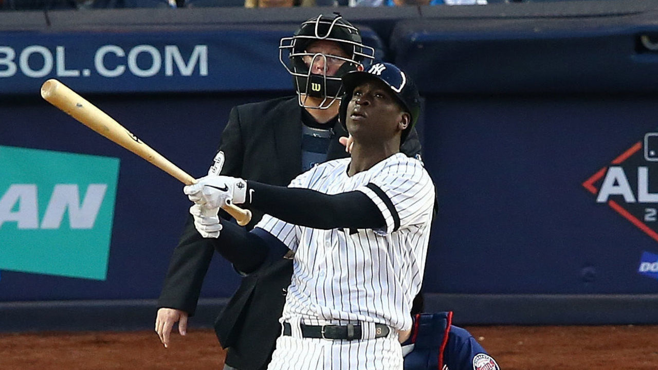NEW YORK, NEW YORK - OCTOBER 05: Didi Gregorius #18 of the New York Yankees connects on a grand slam home run in the third inning against the Minnesota Twins during game two of the American League Division Series at Yankee Stadium on October 05, 2019 in New York City.