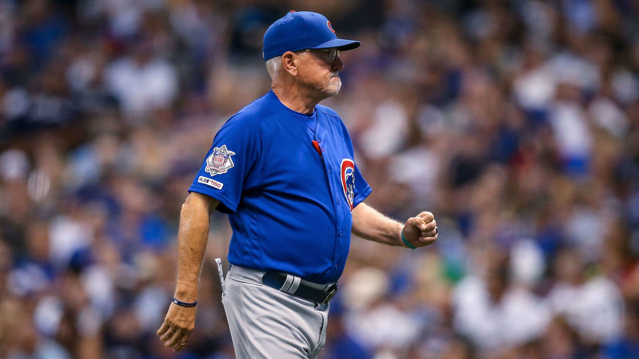 MILWAUKEE, WISCONSIN - JULY 26: Manager Joe Maddon of the Chicago Cubs walks across the field in the sixth inning against the Milwaukee Brewers at Miller Park on July 26, 2019 in Milwaukee, Wisconsin.