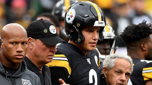 PITTSBURGH, PA - OCTOBER 06: Mason Rudolph #2 of the Pittsburgh Steelers is helped off the field after being knocked out by a hit in the third quarter during the game against the Baltimore Ravens at Heinz Field on October 6, 2019 in Pittsburgh, Pennsylvania.