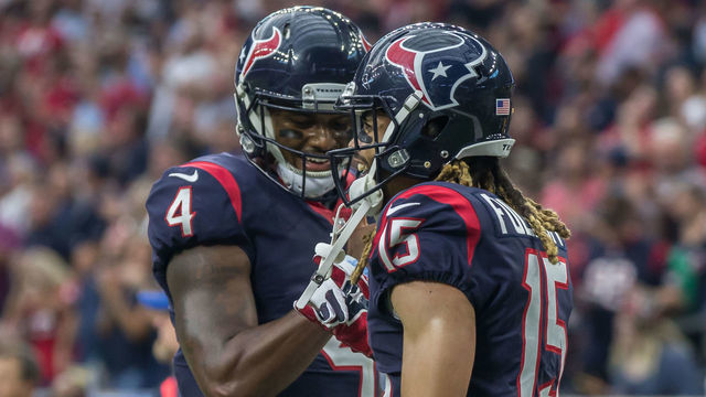 HOUSTON, TX - OCTOBER 01: Houston Texans quarterback Deshaun Watson (4) congratulates Houston Texans wide receiver Will Fuller (15) on his touchdown during the NFL game between the Tennessee Titans and Houston Texans on October 1, 2017 at NRG Stadium in Houston, Texas.