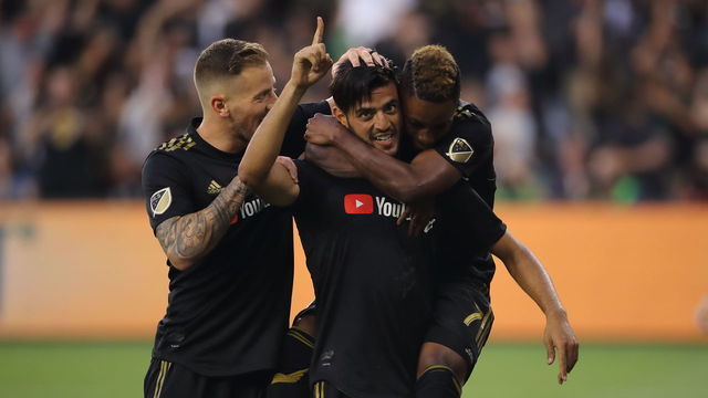 LOS ANGELES, CA - JULY 26: Carlos Vela of LAFC Los Angeles Football Club celebrates after scoring a goal to make it 1-0 during the MLS match between LAFC and LA Galaxy at Banc of California Stadium on July 26, 2018 in Los Angeles, California.