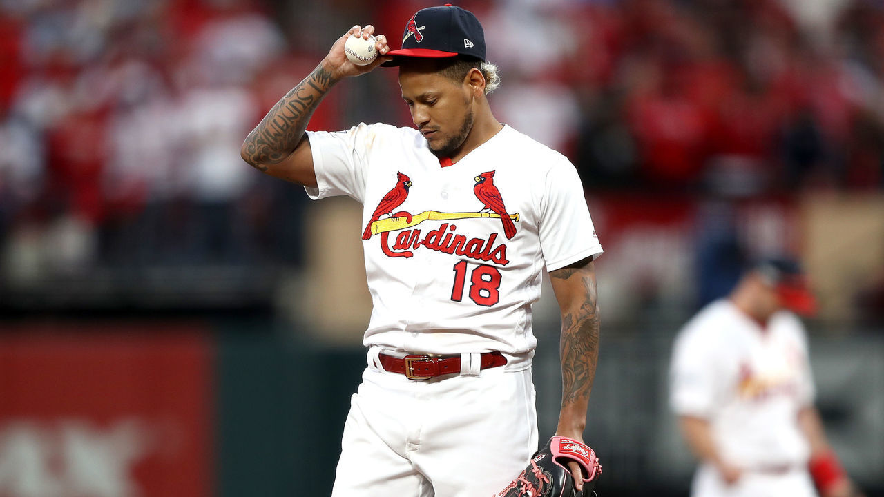 ST LOUIS, MISSOURI - OCTOBER 06: Carlos Martinez #18 of the St. Louis Cardinals reacts after allowing a double to Josh Donaldson (not pictured) of the Atlanta Braves during the ninth inning in game three of the National League Division Series at Busch Stadium on October 06, 2019 in St Louis, Missouri.