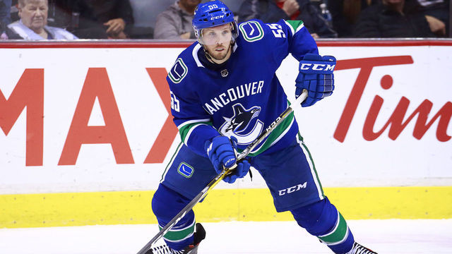 VANCOUVER, BC - MARCH 26: Alex Biega #55 of the Vancouver Canucks skates up ice during their NHL game against the Anaheim Ducks at Rogers Arena March 26, 2019 in Vancouver, British Columbia, Canada. "n