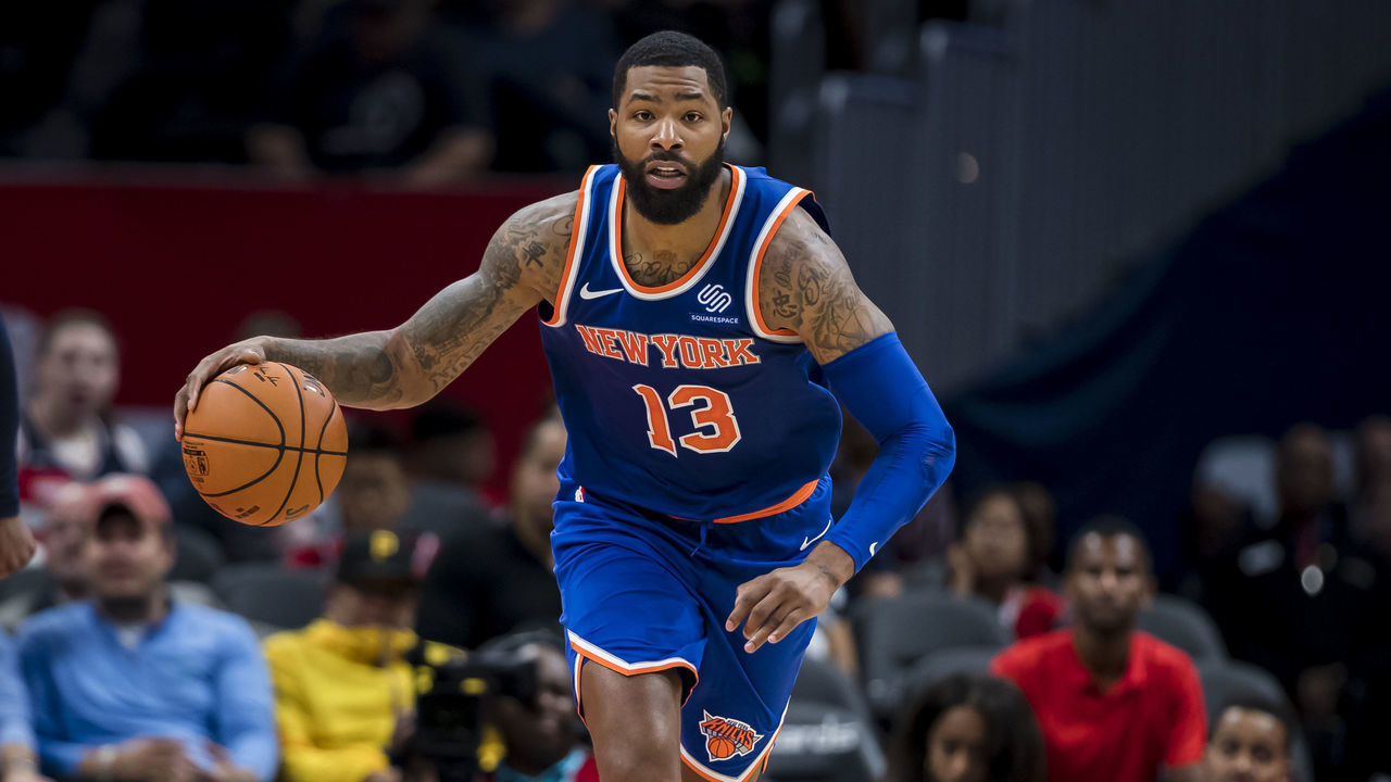 WASHINGTON, DC - OCTOBER 07: Marcus Morris #13 of the New York Knicks dribbles the ball against the Washington Wizards during the first half at Capital One Arena on October 7, 2019 in Washington, DC.