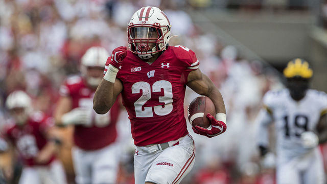 MADISON, WI - SEPTEMBER 21: Wisconsin Badgers running back Jonathan Taylor (23) breaks a lone run for his second touchdown of the first quarter durning a college football game between the Michigan Wolverines and the Wisconsin Badgers on September 21, 2019, at Camp Randall Stadium in Madison, WI.