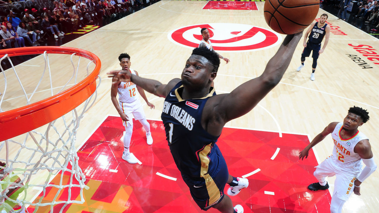 ATLANTA, GA - OCTOBER 7: Zion Williamson #1 of the New Orleans Pelicans dunks the ball against the Atlanta Hawks during a pre-season game on October 7, 2019 at State Farm Arena in Atlanta, Georgia. NOTE TO USER: User expressly acknowledges and agrees that, by downloading and/or using this Photograph, user is consenting to the terms and conditions of the Getty Images License Agreement. Mandatory Copyright Notice: Copyright 2019 NBAE