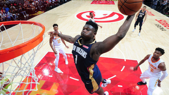 ATLANTA, GA - OCTOBER 7: Zion Williamson #1 of the New Orleans Pelicans dunks the ball against the Atlanta Hawks during a pre-season game on October 7, 2019 at State Farm Arena in Atlanta, Georgia. NOTE TO USER: User expressly acknowledges and agrees that, by downloading and/or using this Photograph, user is consenting to the terms and conditions of the Getty Images License Agreement. Mandatory Copyright Notice: Copyright 2019 NBAE