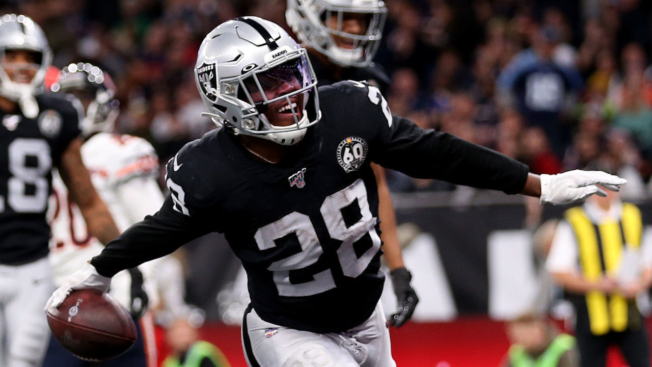 Oakland Raiders Josh Jacobs celebrates scoring his side's 1st touchdown with teammates during the NFL International Series match at Tottenham Hotspur Stadium, London.