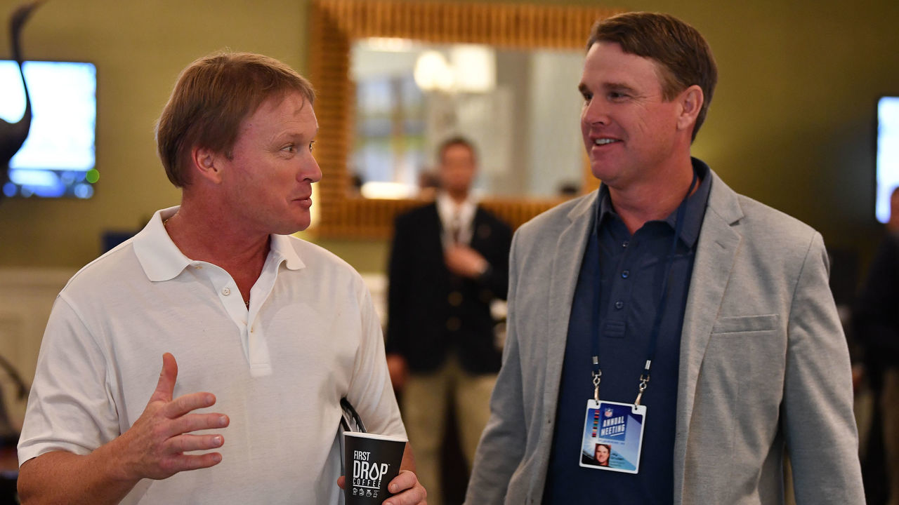 ORLANDO, FL - MARCH 26: Oakland Raiders head coach Jon Gruden and brother and Washington Redskins head coach Jay Gruden attend the 2018 NFL Annual Meetings at the Ritz Carlton Orlando, Great Lakes on March 26, 2018 in Orlando, Florida.