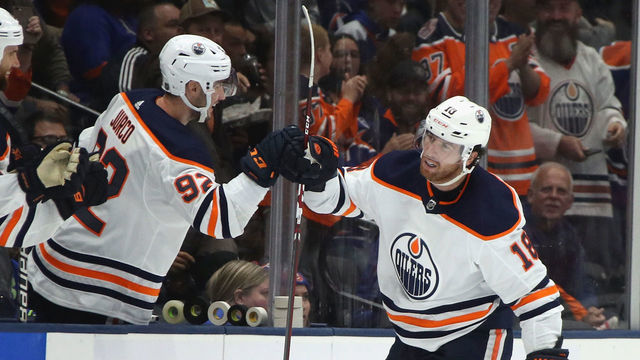 NEW YORK, NEW YORK - OCTOBER 08: James Neal #18 of the Edmonton Oilers scores his hat-trick goal on the power-play at 6:31 of the third period against the New York Islanders at NYCB's LIVE Nassau Coliseum on October 08, 2019 in Uniondale, New York.