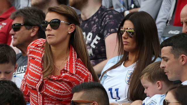 LENS, FRANCE - JUNE 16: Coleen Rooney, wife of Wayne Rooney, with their sons Kai Rooney (left) and Klay Rooney sit in front of Rebekah Vardy, wife of Jamie Vardy during the UEFA EURO 2016 Group B match between England v Wales at Stade Bollaert-Delelis on June 16, 2016 in Lens, France.