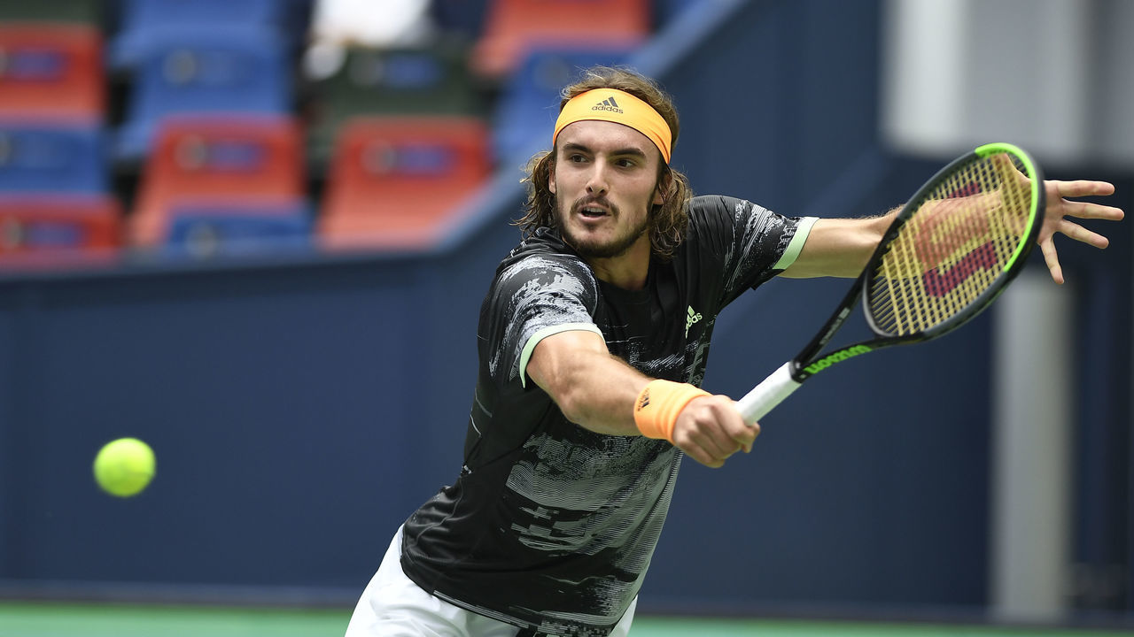 SHANGHAI, CHINA - OCTOBER 09: Stefanos Tsitsipas of Greece returns against Felix Auger-Aliassime of Canada on day five of 2019 Rolex Shanghai Masters at Qi Zhong Tennis Centre at Qi Zhong Tennis Centre on October 9, 2019 in Shanghai, China. (