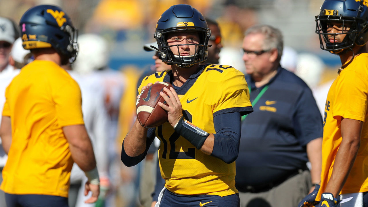 MORGANTOWN, WV - OCTOBER 05: West Virginia Mountaineers quarterback Austin Kendall (12) on the field during pregame warmups prior to the college football game between the Texas Longhorns and the West Virginia Mountaineers on October 5, 2019, at Mountaineer Field at Milan Puskar Stadium in Morgantown, WV.