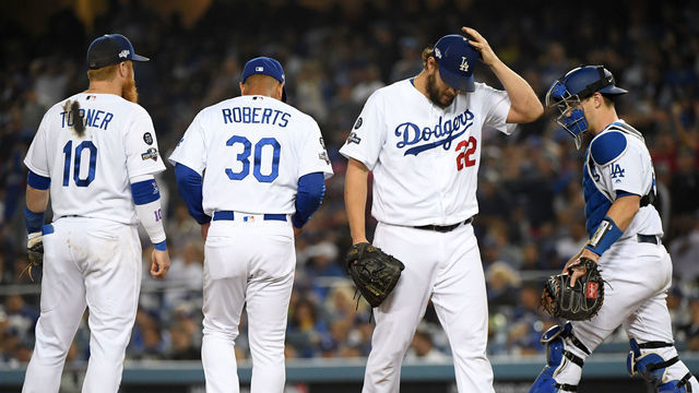 LOS ANGELES, CALIFORNIA - OCTOBER 09: Clayton Kershaw #22 of the Los Angeles Dodgers leaves the game after giving up back to back home runs in the eighth inning of game five of the National League Division Series against the Washington Nationals at Dodger Stadium on October 09, 2019 in Los Angeles, California.