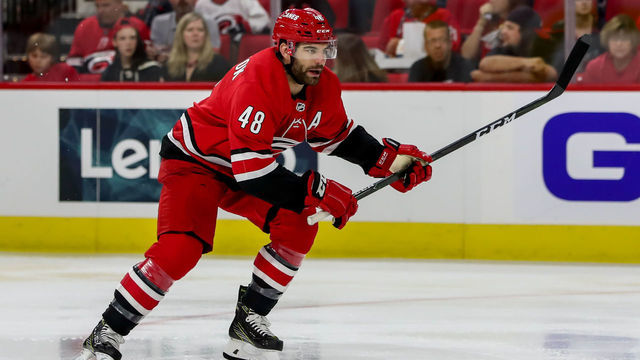 RALEIGH, NC - SEPTEMBER 27: Carolina Hurricanes left wing Jordan Martinook (48) chases a loose puck during an NHL Pre-Season game between the Carolina Hurricanes and the Nashville Predators on September 27, 2019 at the PNC Arena in Raleigh, NC.