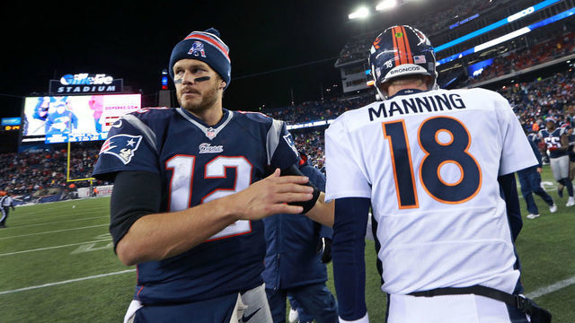 FOXBOROUGH, MA - NOVEMBER 2: As the final 15 seconds tick off the clock, Broncos quarterback Peyton Manning, left, and Tom Brady, right, meet quickly, shook hands even quicker and then they separated. The New England Patriots hosted the Denver Broncos in a regular season NFL game at Gillette Stadium.