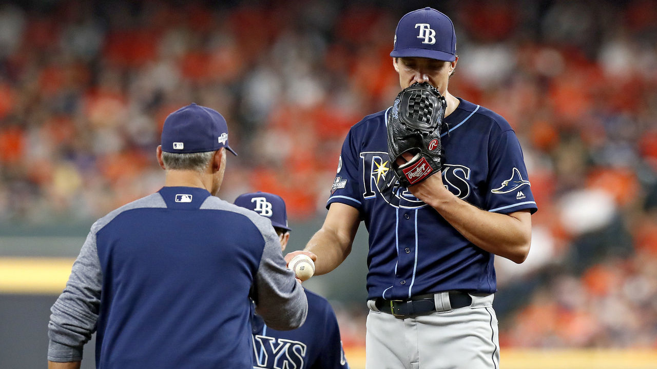 HOUSTON, TEXAS - OCTOBER 10: Tyler Glasnow #20 of the Tampa Bay Rays is taken out of the game by manager Kevin Cash #16 against the Houston Astros during the third inning in game five of the American League Division Series at Minute Maid Park on October 10, 2019 in Houston, Texas.