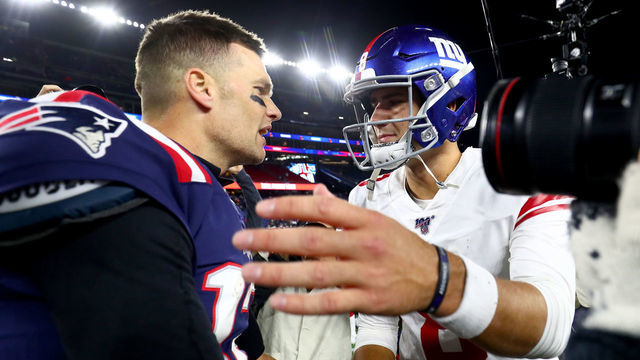 FOXBOROUGH, MASSACHUSETTS - OCTOBER 10: Tom Brady #12 of the New England Patriots shakes hands with Daniel Jones #8 of the New York Giants after their game at Gillette Stadium on October 10, 2019 in Foxborough, Massachusetts. The New England Patriots defeated the New York Giants with a score of 35 to 14.