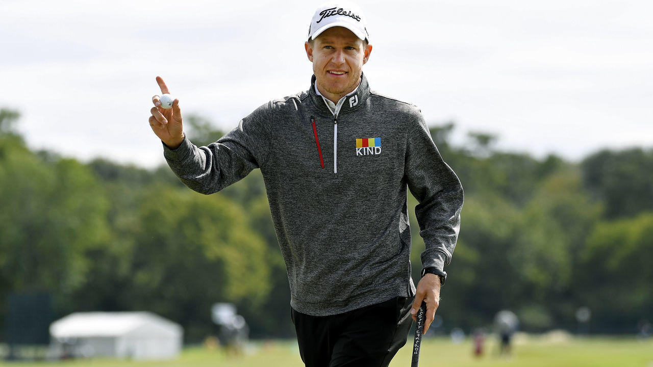 HUMBLE, TX - OCTOBER 11: Peter Malnati waves to the crowd after posting a 65 during the second round of the Houston Open at the Golf Club of Houston on October 11, 2019 in Humble, Texas.