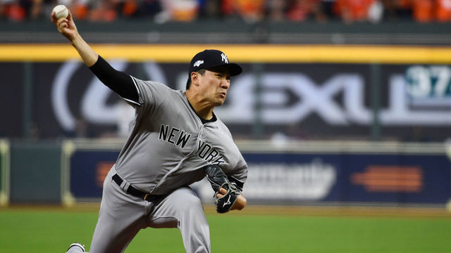 HOUSTON, TX - OCTOBER 12: Masahiro Tanaka #19 of the New York Yankees pitches during Game 1 of the ALCS between the New York Yankees and the Houston Astros at Minute Maid Park on Saturday, October 12, 2019 in Houston, Texas.