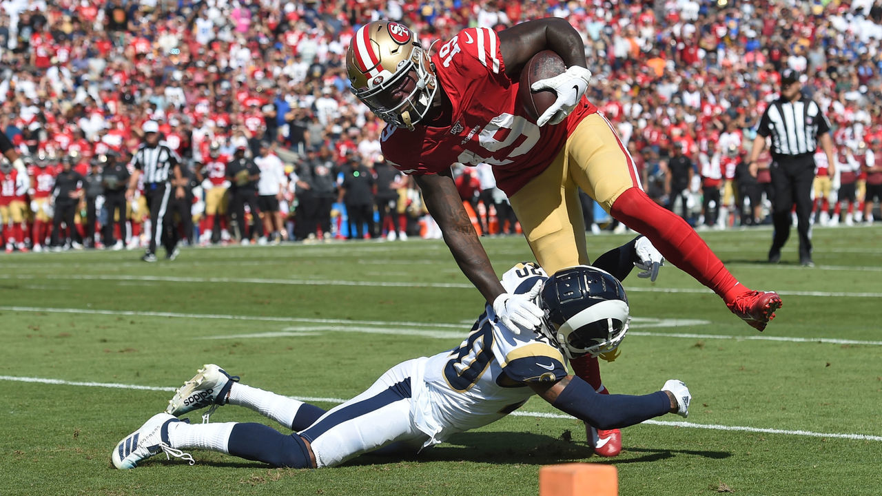 LOS ANGELES, CA - OCTOBER 13: Los Angeles Rams Cornerback Troy Hill (20) stops San Francisco 49ers Wide Receiver Deebo Samuel (19) from running into the end zone during an NFL game between the San Francisco 49ers and the Los Angeles Rams on October 13, 2019, at the Los Angeles Memorial Coliseum in Los Angeles, CA.