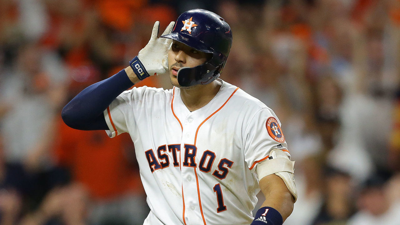 HOUSTON, TEXAS - OCTOBER 13: Carlos Correa #1 of the Houston Astros celebrates hitting a walk-off solo home run during the eleventh inning against the New York Yankees to win game two of the American League Championship Series 3-2 at Minute Maid Park on October 13, 2019 in Houston, Texas.