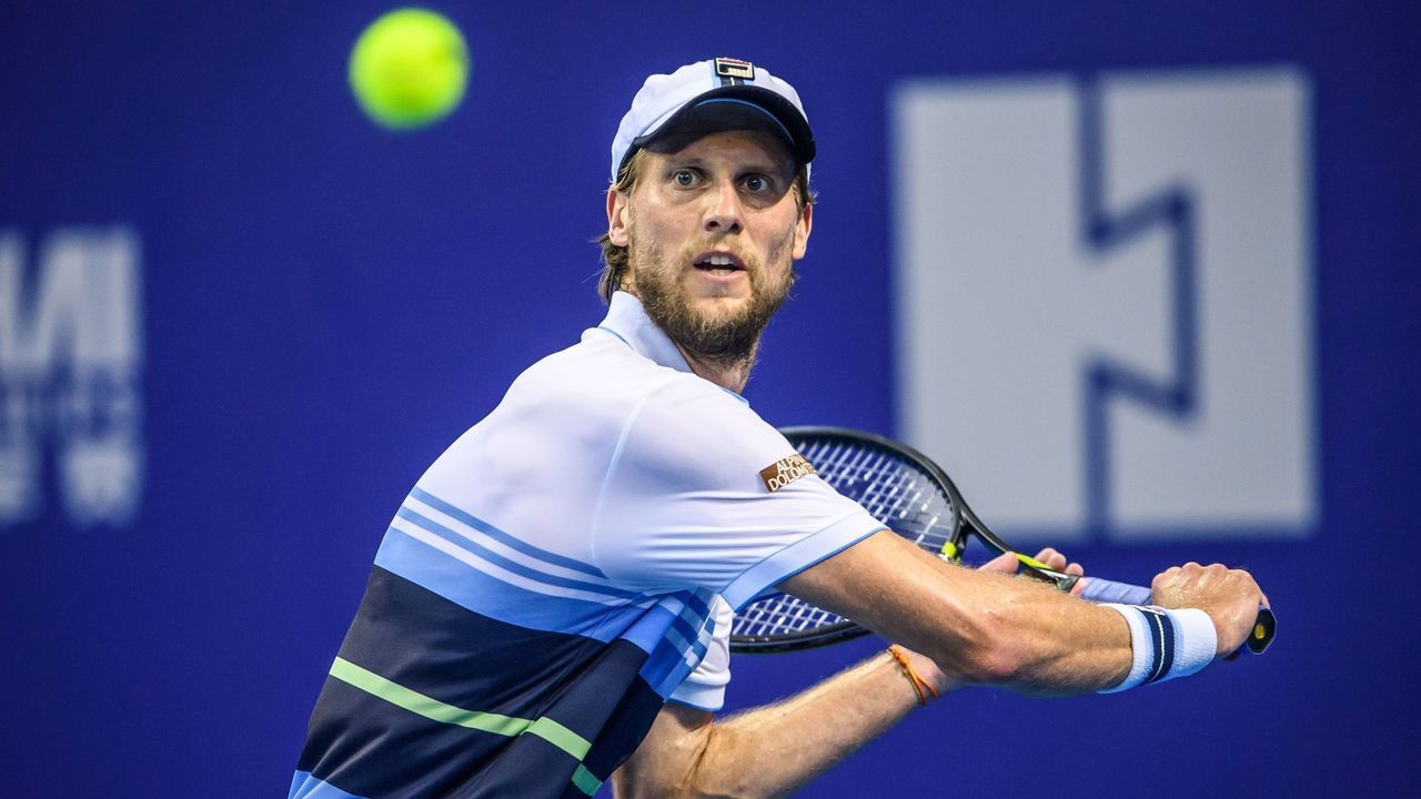 Andreas Seppi of Italy hits a return against Roberto Bautista Agut of Spain during their men's singles quarter-final match at the Zhuhai Championships tennis tournament in Zhuhai in China's southern Guangdong province on September 27, 2019.