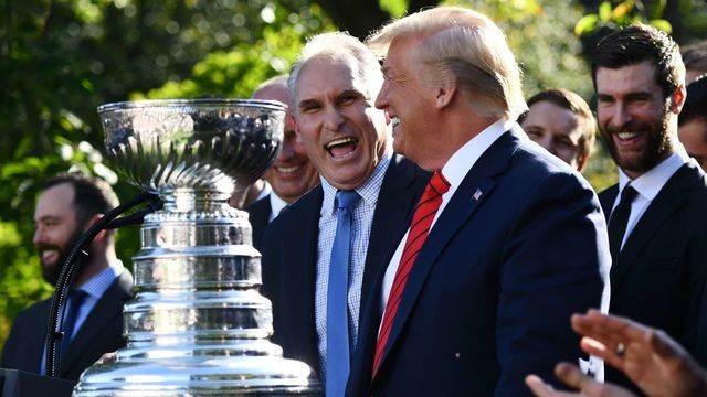 St. Louis Blues coach Craig Berube speaks with US President Donald Trump as the 2019 NHL Stanley Cup winners are welcomed at the White House in Washington, DC, on October 15, 2019.