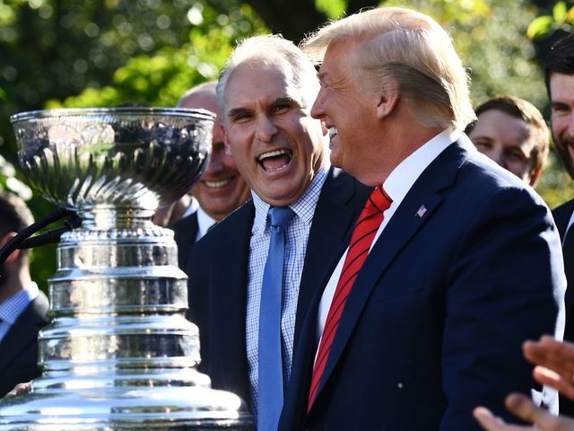 St. Louis Blues coach Craig Berube speaks with US President Donald Trump as the 2019 NHL Stanley Cup winners are welcomed at the White House in Washington, DC, on October 15, 2019.