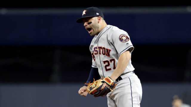 BRONX, NY - OCTOBER 15: Jose Altuve #27 of the Houston Astros reacts to teammate Gerrit Cole #45 striking out Aaron Hicks #31 of the New York Yankees to end the bottom of the sixth inning during Game 3 of the ALCS at Yankee Stadium on Tuesday, October 15, 2019 in the Bronx borough of New York City.