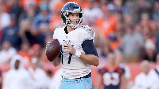 DENVER, COLORADO - OCTOBER 13: Quarterback Ryan Tannehill #17 of the Tennessee Titans throws against the Denver Broncos in the fourth quarter at Broncos Stadium at Mile High on October 13, 2019 in Denver, Colorado.