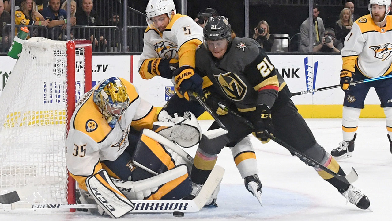 LAS VEGAS, NEVADA - OCTOBER 15: Pekka Rinne #35 of the Nashville Predators makes a save as Cody Eakin #21 of the Vegas Golden Knights and Dan Hamhuis #5 of the Predators fight for position in the second period of their game at T-Mobile Arena on October 15, 2019 in Las Vegas, Nevada.