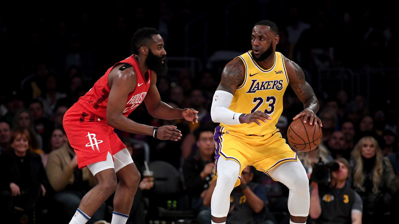 LOS ANGELES, CALIFORNIA - FEBRUARY 21: LeBron James #23 of the Los Angeles Lakers backs in on James Harden #13 of the Houston Rockets during a 111-106 Laker win at Staples Center on February 21, 2019 in Los Angeles, California.
