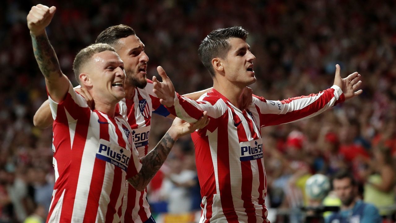 MADRID, SPAIN - AUGUST 18: Atletico Madrid's Alvaro Morata (R) celebrates with Kieran Trippier (L) and Koke (C) after scoring a goal during the La Liga soccer match between Atletico Madrid and Getafe CF at the Wanda Metropolitano Stadium in Madrid, Spain on August 18, 2019.