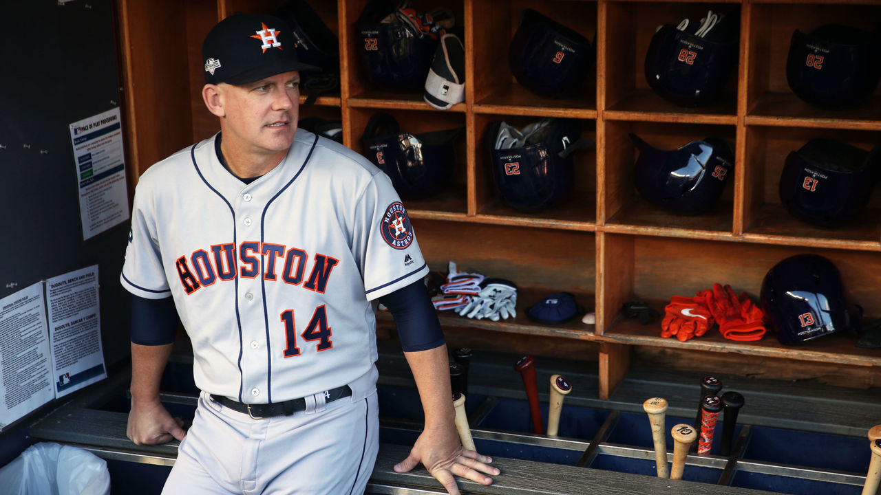 BRONX, NY - OCTOBER 15: Houston Astros manager AJ Hinch #14 looks on from the dugout prior to Game 3 of the ALCS between the Houston Astros and the New York Yankees at Yankee Stadium on Tuesday, October 15, 2019 in the Bronx borough of New York City.